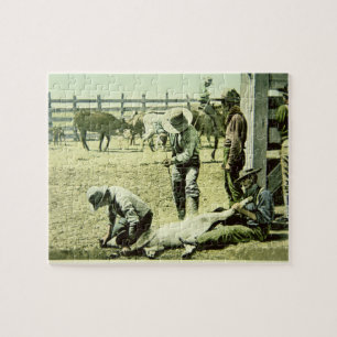 Quebra-cabeça Vaqueiros americanos que marcam uma vitela, c.1900
