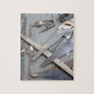 Quebra-cabeça velho da foto da ferramenta com