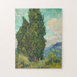 Quebra-cabeça Vincent Van Gogh Cypress<br><div class="desc">Belo trabalho de arte impressionista famoso pintor impressionista Vincent Van Gogh. Esta arte impressionista mostra ciprestes em um campo em frente a nuvens girando e uma lua no céu. As lágrimas,  amarelos e verdes fazem um quebra-cabeça adorável.</div>