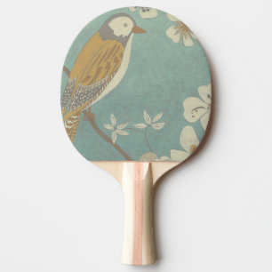 Raquete De Ping Pong Amarelo, Cinza e Pássaro bege tocados em uma rami
