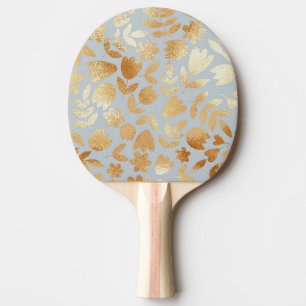 Raquete De Ping Pong Douradas flores, fundo azul, imitação de folhas.
