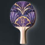 Raquete De Ping Pong Elegant Art Deco Purple and Gold Monogram Design<br><div class="desc">This sophisticated vintage‑inspired design features rich purple and gold tones arranged in classic Art Deco geometric styling, paired with a personalized monogram initial for a luxurious finishing touch. The timeless 1920s elegance and refined symmetry give your ping pong paddle an upscale, standout look on the court. A beautiful gift idea...</div>