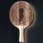 Raquete De Ping Pong Pallet Wood Board Pineapple Wedding Crest & Names<br><div class="desc">Pallet Wood Board Pineapple Wedding Crest and Names Ping Pong Paddle carries a joyful and refined presence, where tropical symbolism meets an elegant crest design that feels both celebratory and timeless. Its expressive composition brings warmth and character to weddings, receptions, and gatherings, creating an atmosphere filled with connection and delight....</div>