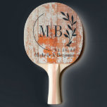 Raquete De Ping Pong Worn Barn Wood Leaf Wedding Monogram<br><div class="desc">Worn Barn Wood Leaf Wedding Monogram Ping Pong Paddle brings a gentle rustic elegance to every rally, blending the joyful spirit of a wedding celebration with the playful rhythm of friendly competition. The leafy motif evokes the beauty of countryside ceremonies and open air receptions where friends and family gather beneath...</div>