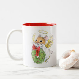 Rato do anjo do Natal com caneca da grinalda