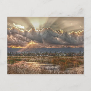 Rays no cartão postal do pôr do sol