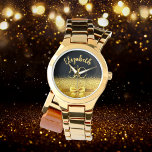 Relógio 50º aniversário nome de ouro negro<br><div class="desc">Elegante,  clássico,  glamouroso e feminino. Um arco e fita coloridos de ouro,  um pouco de bico e luxo para um presente de aniversário ou guarnição. Fundo preto. Modelos para o nome dela e os 50 anos. O nome é escrito com um moderno estilo escrito à mão.</div>