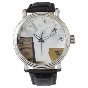 Relógio Aviões sobrevoando edifícios