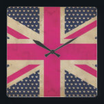 Relógio de Parede do Sinalizador da Tomada Rosa An<br><div class="desc">Um design gráfico ilustrado de uma bandeira antiga da bandeira do Jack Union em tons de rosa e branco contra uma cor de fundo de azul escuro com corações brancos adequados para todos os produtos zazzle.</div>
