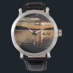 Relógio De Pulso Sunset no Lago Wrist Watch<br><div class="desc">Este relógio de pulso, com seu único rosto de foto cênico e correia preta de couro é um presente de excelente para um aposentado, aniversário, Dia de os pais, Natal ou outra ocasião. O rosto de relógio é uma paisagem original tirada ao pôr do sol em Caples Lake na Califórnia....</div>