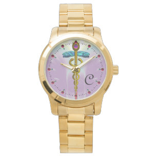 Relógio DOURADO CADUCEU COM NÓS CELTICOS Lilac MONOGRAMA
