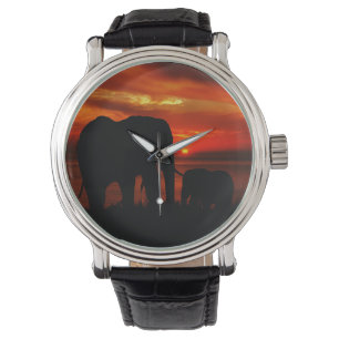 Relógio Elefantes ao Pôr do Sol