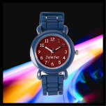 Relógio ESCOLHA SUAS CORES, Seu Nome, Crianças Pulso Azul<br><div class="desc">Este relógio de pulso para crianças divertidas com uma pulseira azul de silicone pode ser personalizado como você quiser. Você pode ESCOLHER SUA PRÓPRIA COR para substituir o fundo na face de relógio e fazer o texto dizer o que quiser. Ou guarde meu design branco e burro. Todos os Direitos...</div>