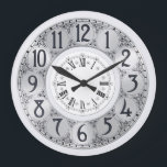 Relógio Grande Art Deco Elegante na moda faux prata unisex presen<br><div class="desc">Uma ilustração de arte antiga,  com círculos falsos prateados revestidos de preto,  ao redor dos quais aparecem os rabiscos pretos,  é enquadrada por um círculo branco menor,  no qual aparecem os algarismos romanos.</div>