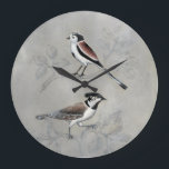 Relógio Grande Aviário Silvered| Um par<br><div class="desc">Este impressão de aquarela apresenta dois pássaros salpicados em uma árvore| Por Naomi McCavitt</div>