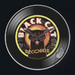 Relógio Grande Black Cat LP Art Deco<br><div class="desc">Você é o gato mais legal por aí? Pensamos que sim! .. e criou a última afirmação em humor e música. Sleek e esperto, nossa combinação de gata misteriosa e etiqueta de música suave terá todos seus amigos se perguntando onde você conseguiu... pegue um pouco de frieza com esse design...</div>