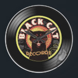 Relógio Grande Black Cat LP Art Deco<br><div class="desc">Você é o gato mais legal por aí? Pensamos que sim! .. e criou a última afirmação em humor e música. Sleek e esperto, nossa combinação de gata misteriosa e etiqueta de música suave terá todos seus amigos se perguntando onde você conseguiu... pegue um pouco de frieza com esse design...</div>