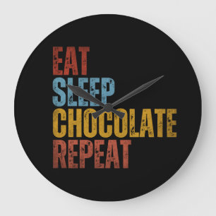 RELÓGIO GRANDE COMER O CHOCOLATE DE SONO