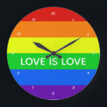 Relógio Grande Rainbow Love é Love Orgulho gay LGBTQ Beauful<br><div class="desc">orgulho gay arco-íris striped wall clock que lê Love is Love (Amor é Amor). Suporte LGBTQ bonito para todos os seus amigos e familiares gay, lésbicas, bissexuais, transexuais e panssexuais. Apoiar a igualdade de direitos para todos os seres humanos, independentemente de quem eles amem e da sua identificação de gênero.Cortesia...</div>