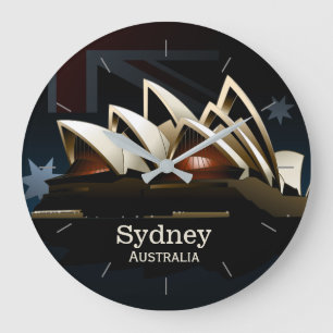 Relógio Grande Teatro da ópera de Sydney na noite