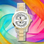 Relógio Modern Black Floral Wreath Split Monogram "L"<br><div class="desc">This refined floral split monogram wreath design features a delicate botanical arrangement forming a graceful circular frame around a customizable monogram "L" and name. The balanced composition highlights elegant leaves and floral accents that create a timeless and sophisticated look. This beautiful ladies watch is perfect for personalized gifts, this design...</div>
