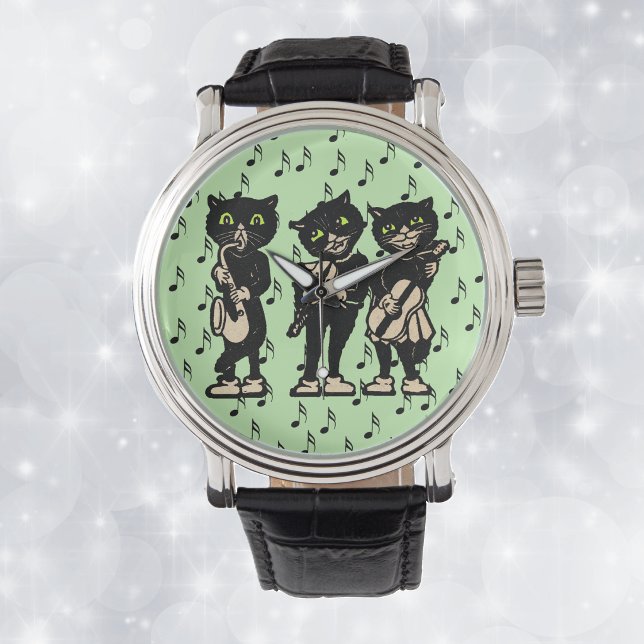 Relógio Músico Vintage Gatos Pretos Notas Musicais (Three black cats playing musical instruments black music notes on light green wrist watch.)