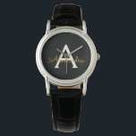 Relógio Nome de monograma feminino com script moderno em o<br><div class="desc">Relógio com nome de monograma de script simples preto e dourado. Isso torna o presente perfeito para formatura,  aniversário,  casamento,  chá de noiva,  aniversário de casamento,  chá de bebê ou festa de despedida de solteira para alguém que ama luxo glamoroso e estilos chiques.</div>