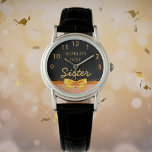 Relógio O melhor arco de ouro negro da Irmã Mundial<br><div class="desc">Elegante, clássico, glamouroso e feminino. Um arco e fita coloridos de ouro, um pouco de bling e luxo para um aniversário ou presente de Natal para sua irmã. Fundo preto de música. Com o texto: A Melhor Irmã do Mundo. Números de relógio do ouro de 9 a 3. Este relógio...</div>