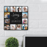 Relógio Quadrado Amando a vida com você Cite 12 Foto Preta<br><div class="desc">Relógio fotográfico com citação feliz e 12 de suas fotos favoritas de família e amigos. O modelo de foto está configurado para você criar sua própria colagem de fotos no estilo de grade para enquadrar a citação que diz "amar a vida com você". O design é escrito em uma escrita...</div>