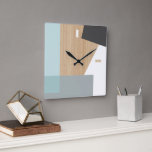 Relógio Quadrado Arte Padrão De Blocos Modernos Sobre Faux Woodgrai<br><div class="desc">Cinzas modernas, brancas, escuras e claras, e padrão verde verde azul-turquesa verde-azul-claro sobre um fundo de madeira verde-claro-bege-claro, de cor azul-escura. Clássico retro chic, elegante mas simples design básico para o designer artístico de moda de decoração de casas, popular motif de quadril, estilo metif de meio século. Disponível em sotaques...</div>