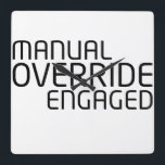 Relógio Quadrado Chronological Sync Technical Clock<br><div class="desc">Monitor the duration of your manual overrides. This wall-mounted timepiece removes visual clutter,  focusing on high-contrast numerals and bold text to synchronize your studio’s operations.</div>