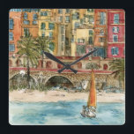 Relógio Quadrado Destinos | Praia e Edifícios Aquarela<br><div class="desc">Uma bela aquarela e design de tinta criada pela brilhante Melissa Wang, trazida a vocês pelo World Art Group. No primeiro plano desta peça podemos ver um pequeno veleiro ao largo de uma pequena praia povoada por vários itens, pessoas e palmeiras. Esta cena pode ocorrer em uma cidade sagrada ou...</div>