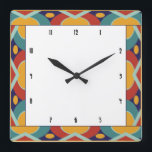 Relógio Quadrado Fronteira de deco de arte colorida<br><div class="desc">Borda geométrica colorida com estilo Art deco com vermelho, ouro, azul e lacre, um esquema de cores de período deco. Ovais e quadrados no estilo retrô formam uma borda ao redor do centro preto e branco com uma fonte deco vintage para os números de relógio. A arte deco é um...</div>