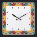 Relógio Quadrado Fronteira de deco de arte colorida<br><div class="desc">Borda geométrica colorida com estilo Art deco com vermelho, ouro, azul e lacre, um esquema de cores de período deco. Ovais e quadrados no estilo retrô formam uma borda ao redor do centro preto e branco com uma fonte deco vintage para os números de relógio. A arte deco é um...</div>