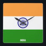 Relógio Quadrado India Flag Dazzling Patriotic Square<br><div class="desc">India Flag Dazzling Patriotic Square Wall Clock in the colors and the elements of the India national flag covering the front of the clock. National flag colors are complemented with the text "India" on the bottom. Text is fully customizable using "Customize it!" feature. Feel free to change it, remove it...</div>