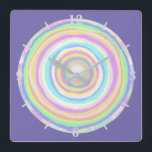 Relógio Quadrado Jawbreak Slice Candy<br><div class="desc">Relógio de Arte de Parede Quadrado e acessório casual divertindo-se com decoração, com a ilustração do trabalho de arte do Jawbreak Candy Slice, de TheFabricSeal em Zazzle.com, é um design de corte divertido e colorido com cores circulares pastéis do arco-íris e além. Tons de paleta colorida de rosa, roxo, amarelo,...</div>
