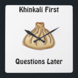 Relógio Quadrado Khinkali<br><div class="desc">Khinkali is a traditional Georgian dish that has become a symbol of Georgian hospitality. These large, hand-crafted dumplings are filled with a savory mixture of minced meat (usually beef and pork), herbs, and spices. The dough is carefully wrapped around the filling, creating a beautiful knot at the top, which also...</div>