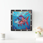 Relógio Quadrado Peixe Patriótico pop Art<br><div class="desc">Este vibrante relógio de parede apresenta um peixe único estilo de arte pop, corajosamente adornada com as estrelas da bandeira americana e listras contra um fundo azul dinâmico com contornos vermelhos. Este cronograma artístico é uma adição lúdica, mas patriótica, a qualquer decoração doméstica, oferecendo uma obra colorida e moderna que...</div>