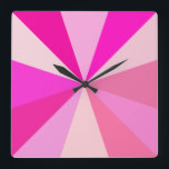 Relógio Quadrado Pop Art moderno dos anos 60, Raios Geométricos Fun<br><div class="desc">Este relógio quadrado de pop de arte,  inspirado na década de 60,  tem raios rosa psíquicos / explosões de sol a disparar num padrão geométrico. Há doze raios para marcar o tempo - não há necessidade de números neste relógio giro,  minimalista,  ultra-mod e giro. É groovy,  querida.</div>
