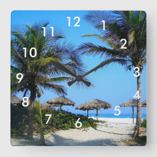 Relógio Quadrado Praia Arenosa Com Palmeiras e Vista Para o Oceano 