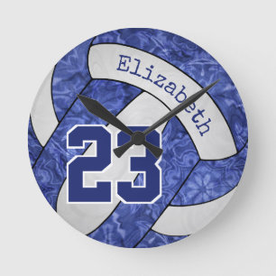 Relógio Redondo equipe de vôlei azul e branca adota hábitos para