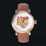 Relógio Stay Positive – Floral Motivational<br><div class="desc">Brighten your day with this uplifting design! The bold phrase STAY POSITIVE is highlighted with vibrant colors and surrounded by cheerful floral elements,  making it a perfect reminder to embrace optimism and good vibes. Ideal for casual wear,  workouts,  or as a thoughtful gift to inspire positivity.</div>