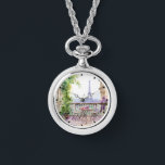 Relógio Watercolor Eiffel Tower Paris Café Francês<br><div class="desc">Watercolor Torre Eiffel Torre Paris Cafe Watch Necklace apresenta uma zona de assentos de café francês com aquarelas,  com Paris e a Torre Eiffel em segundo plano. Criado pelo Evco Studio www.zazzle.com/store/evcostudio</div>