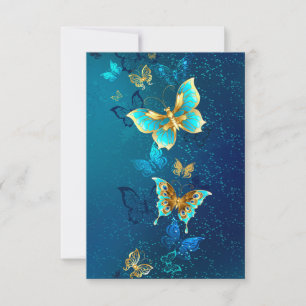 Reserve A Data Borboletas de ouro em um fundo azul