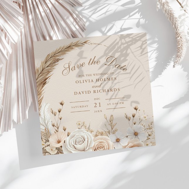 Reserve A Data Casamento Rustic de Flores Selvagens Secas e Rosas (Rustic Dried Wildflowers and White Roses Wedding Save The Date on a sunny table with dry botanicals)