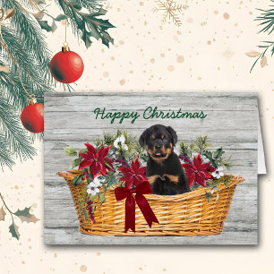 Rottweiler Puppy no Cartão de Natal do Cesto