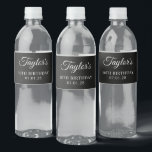 Rótulo De Garrafa De Vinho Elegante Script 50th Birthday<br><div class="desc">Crie as suas etiquetas modernas minimalistas de 50º aniversário da garrafa de água. Uma caligrafia elegante clássica emparelhada com uma fonte serif de todos os bonés. Personalize o fundo preto ou os estilos de fonte branca para criar o seu próprio para a celebração especial dela. Adorável preto contemporâneo com design...</div>