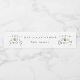 Rótulo Para Garrafa D'água Um bebê está a fazer chá de fraldas de cerveja a a