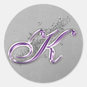 Roxo e etiqueta do monograma K do brilho da prata