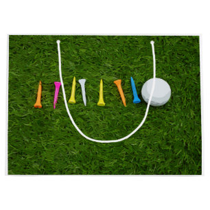 Sacola Para Presentes Grande Bola de golfe com camisetas no golfe de grama verd